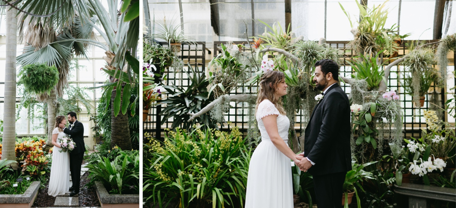 bride and groom standing together in greenhouse baltimore conservatory