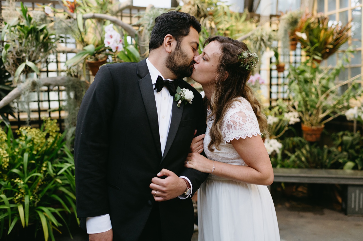bride and groom kissing elopement day
