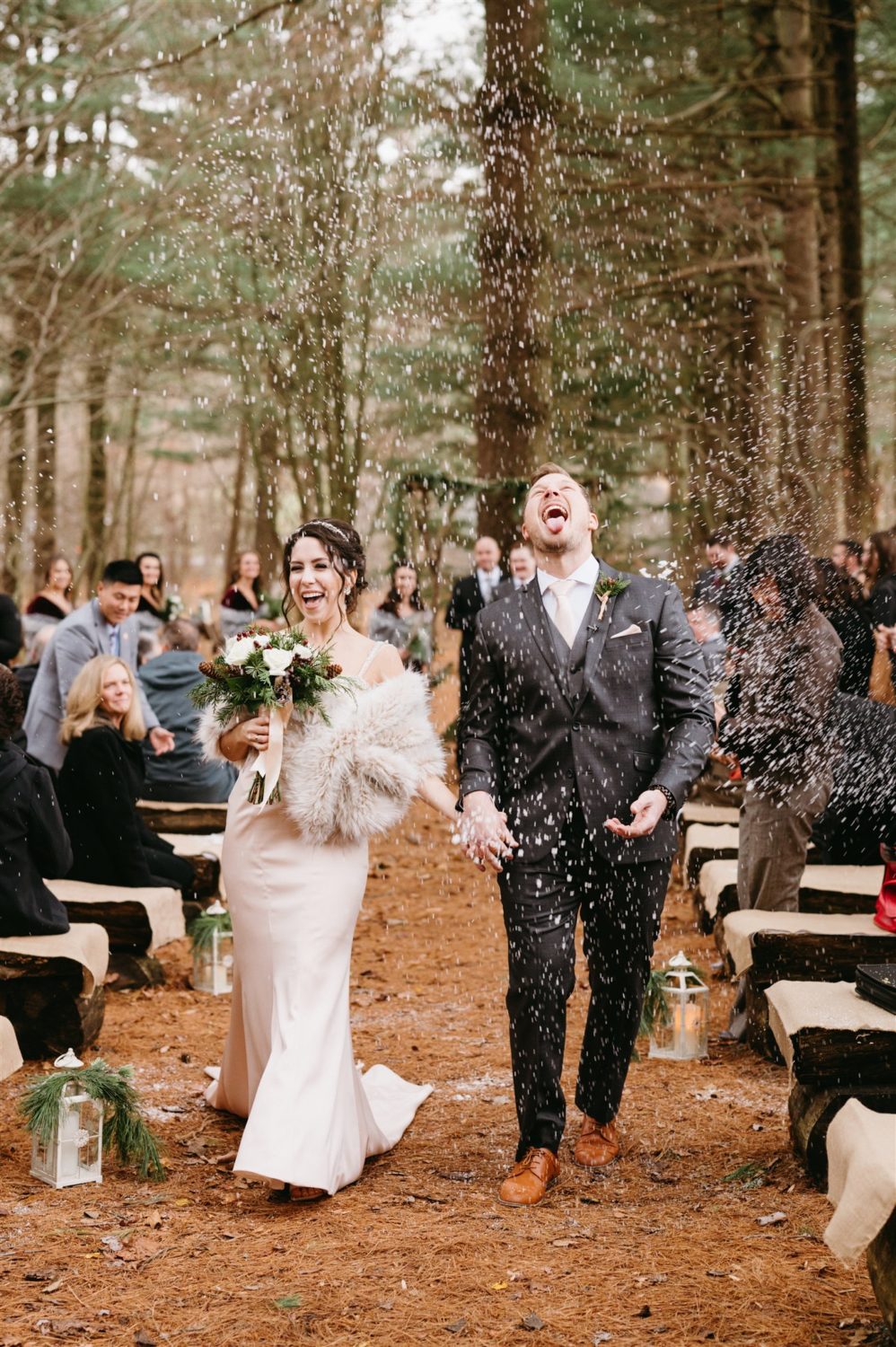 bride and groom unique wedding exit artificial snow
