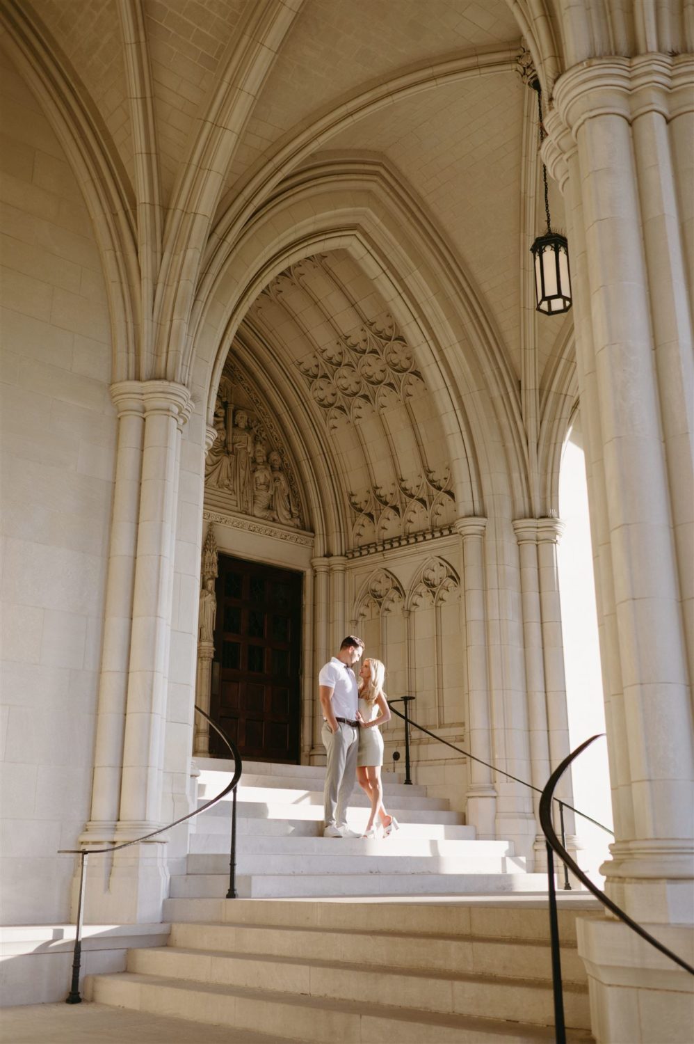 national cathedral engagement photos couple pose