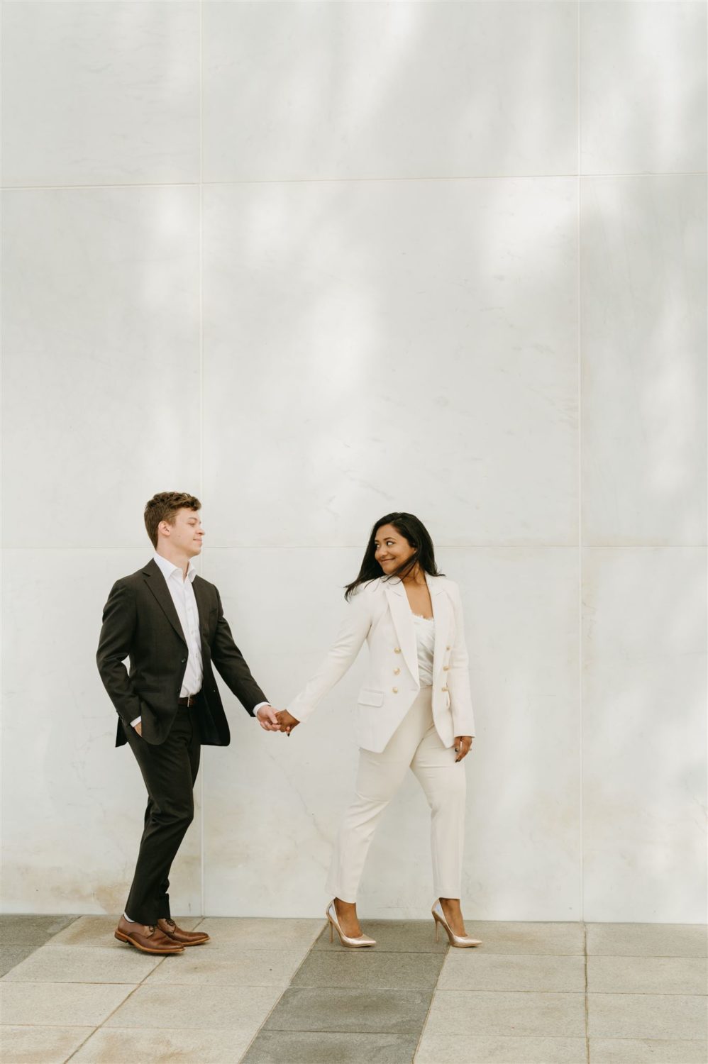 kennedy center engagement session couple walking pose