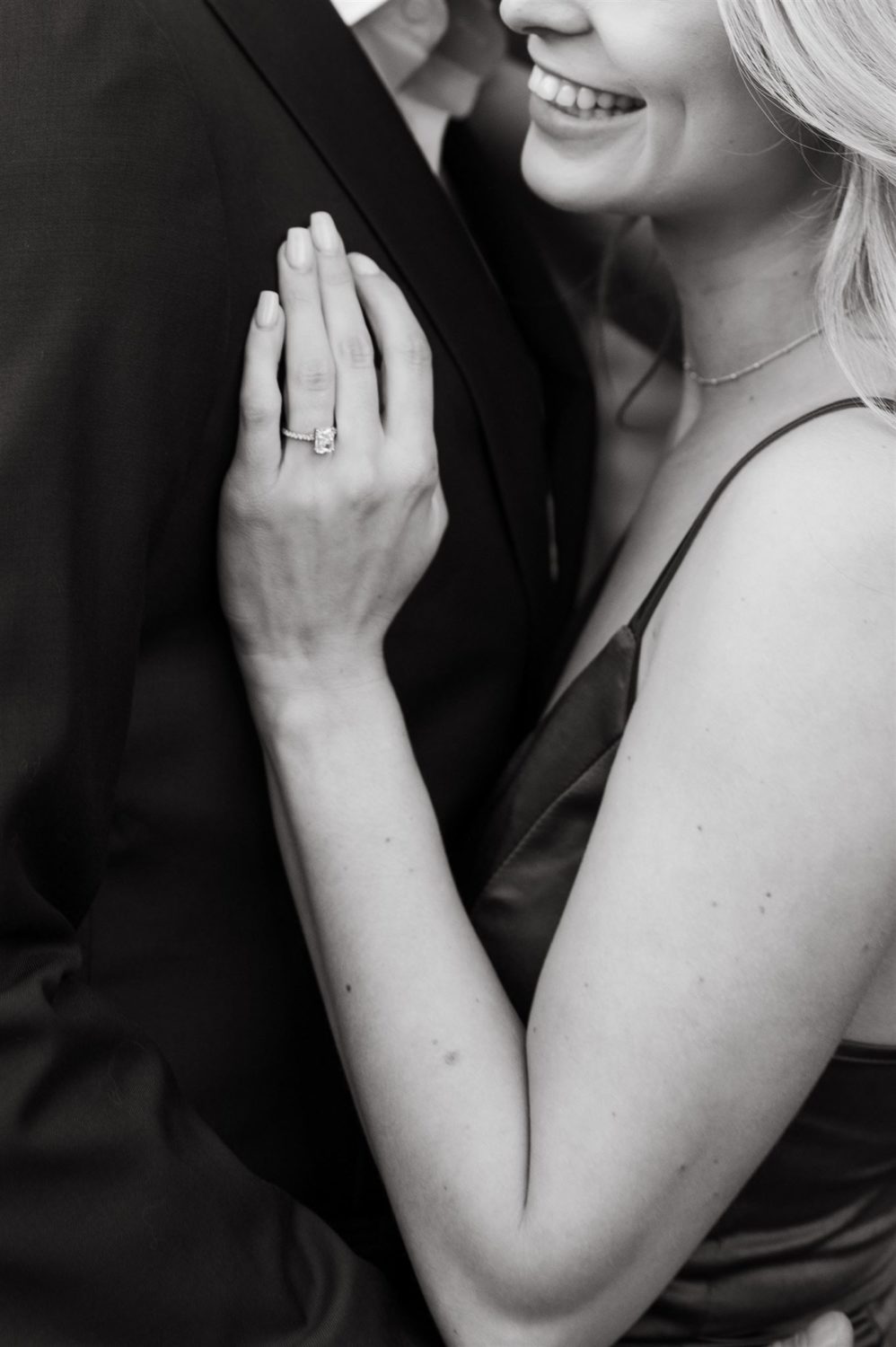 couple engagement ring side profile photo