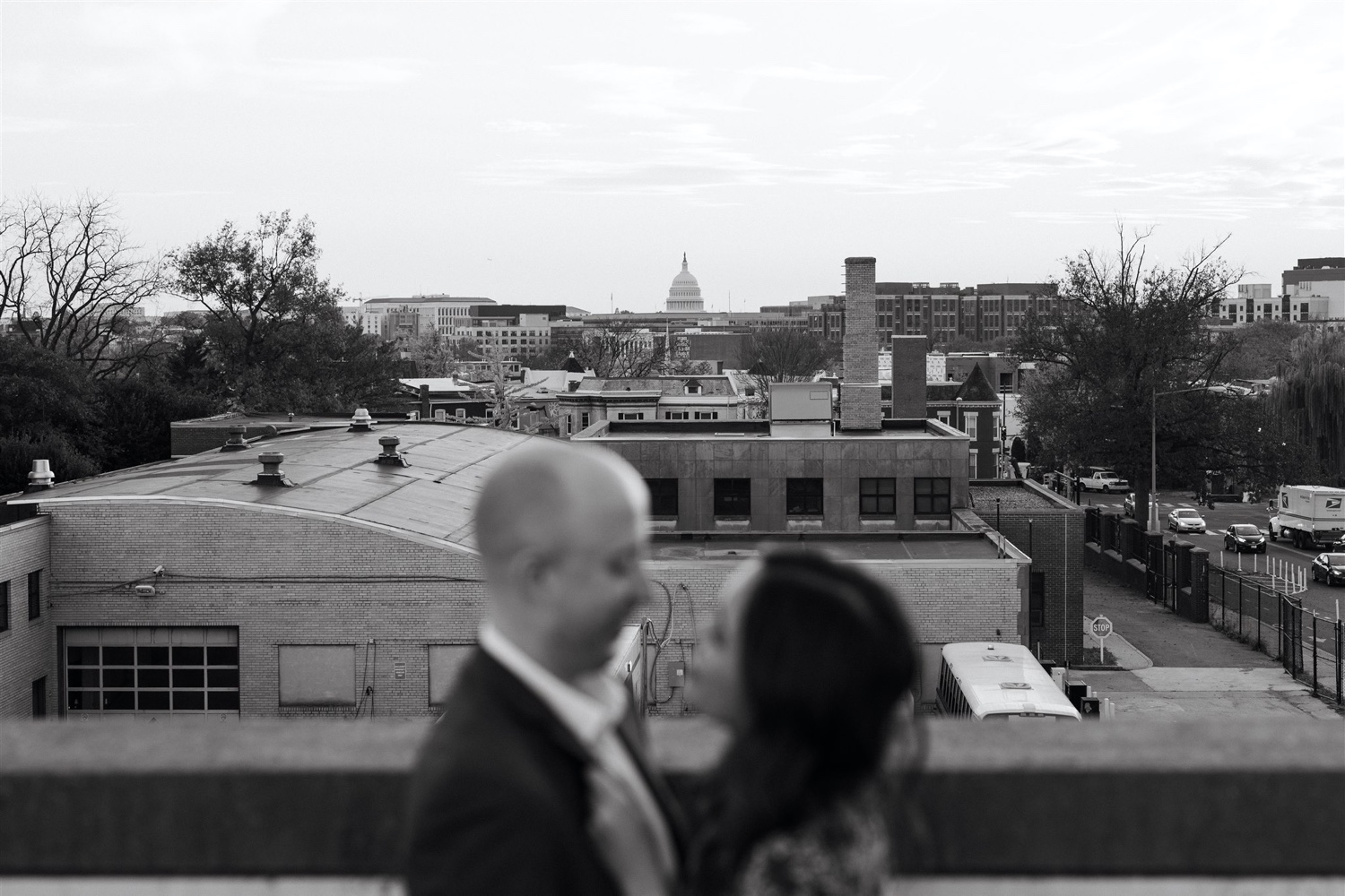 black and white h street engagement session foreground blur
