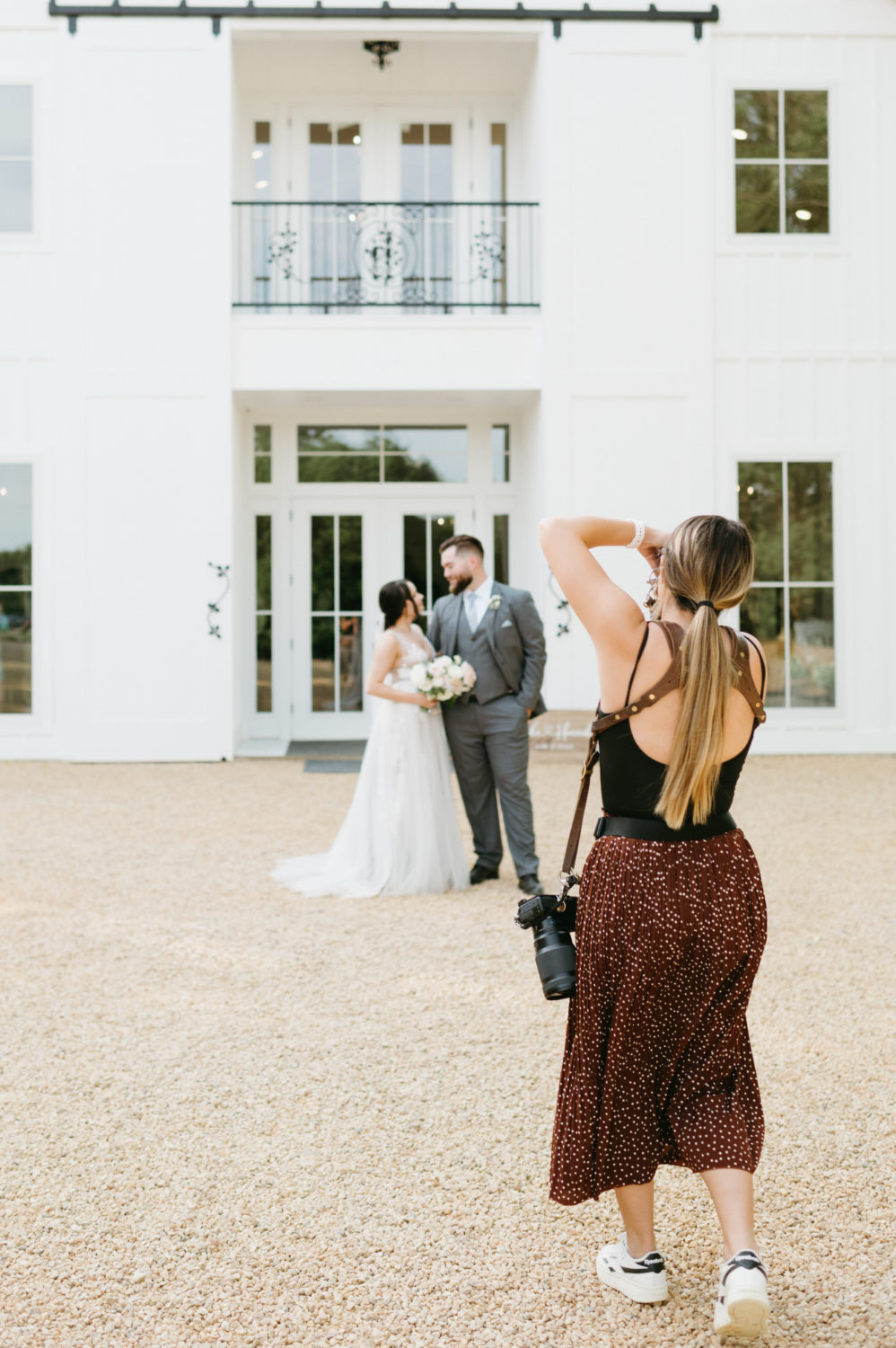 bride and groom wedding photographer behind the scenes