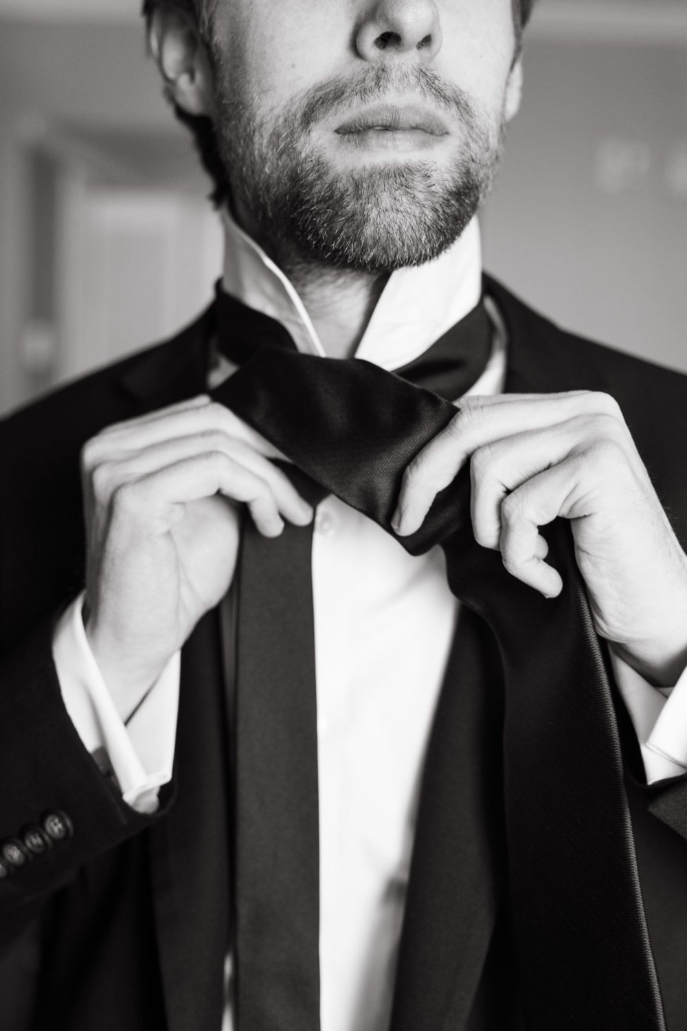 intimate wedding larz anderson house black and white groom getting ready