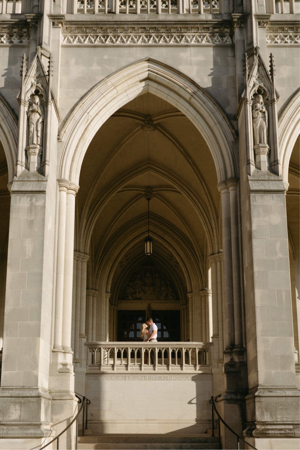 washington national cathedral engagement couple kissing architecture foreground