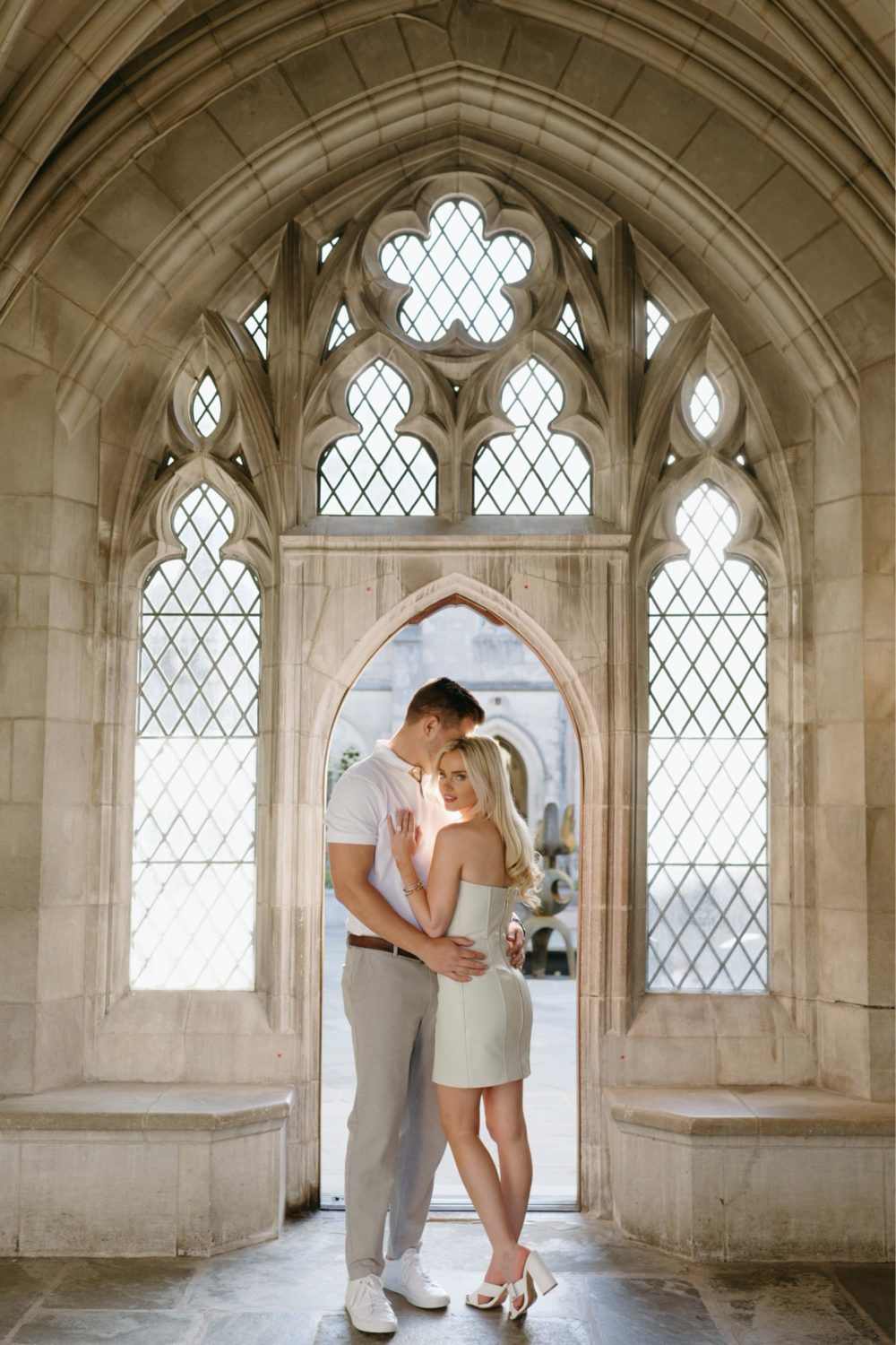 washington national cathedral engagement couple framed in doorway