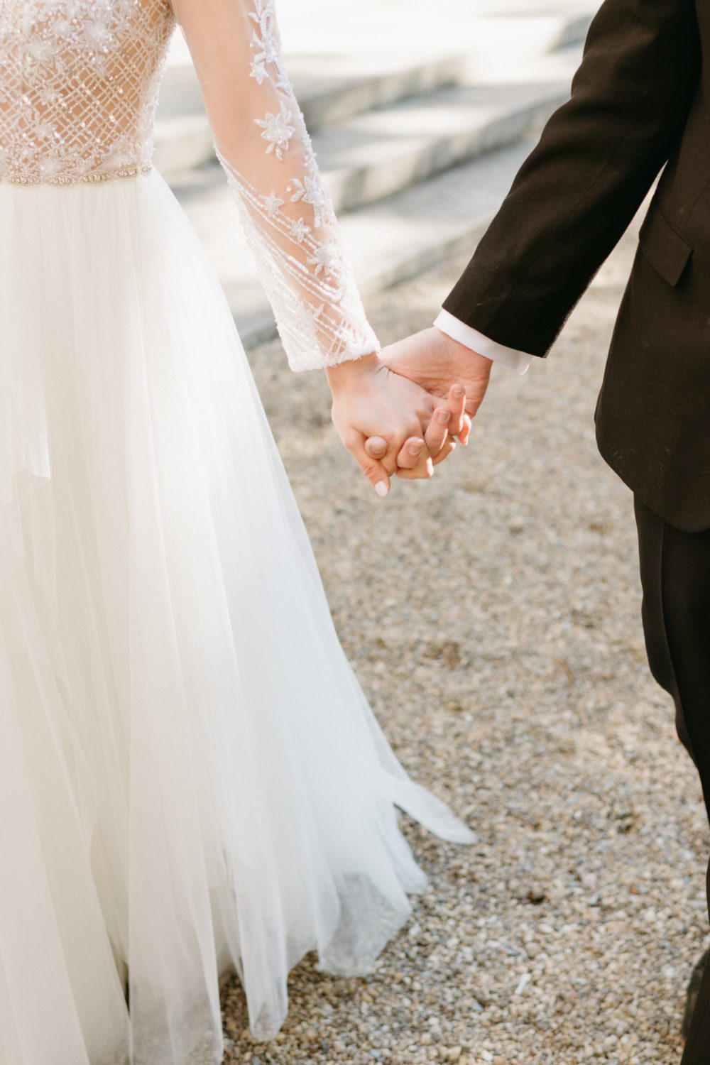 intimate wedding larz anderson house bride and groom holding hands
