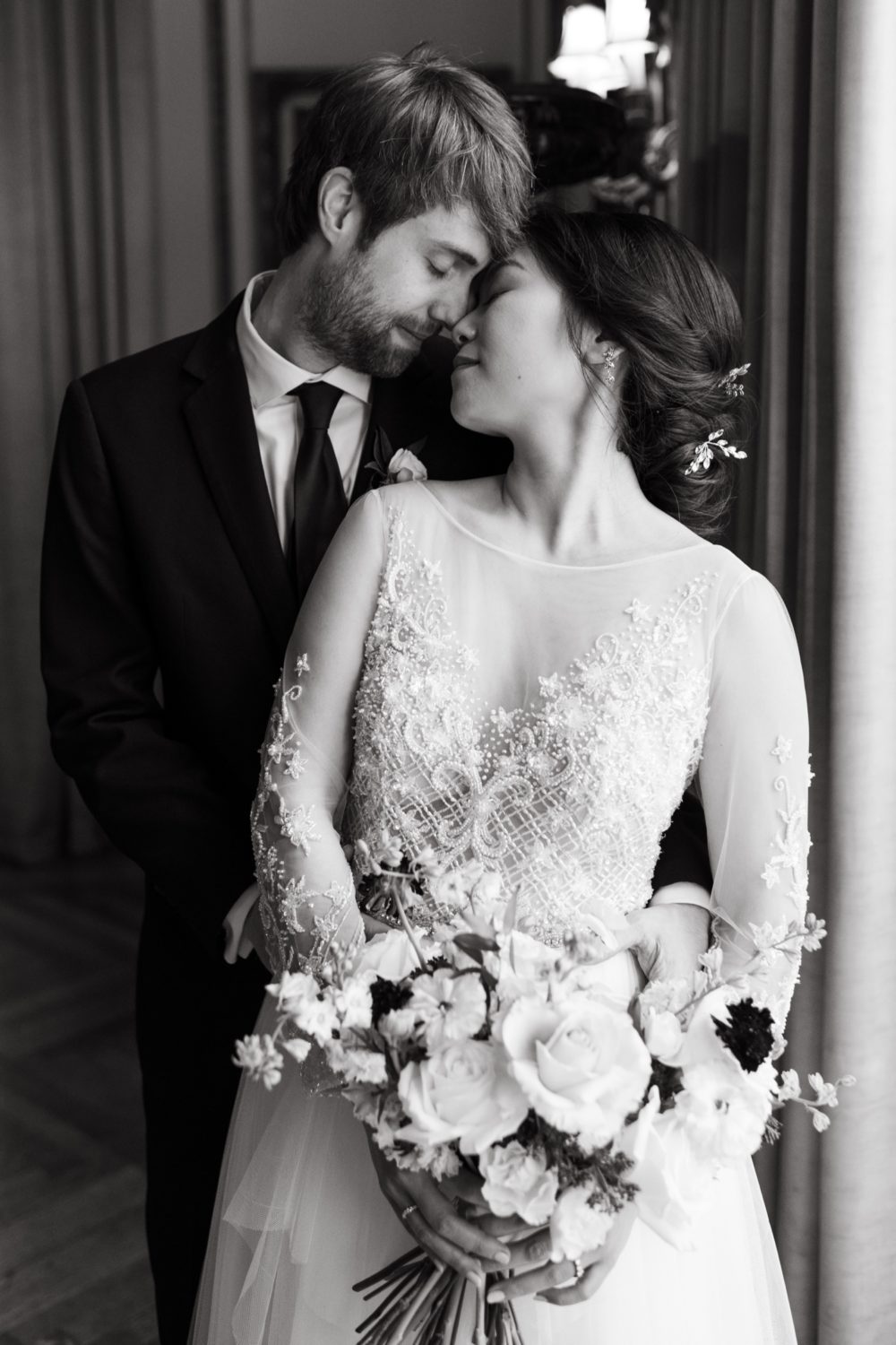 black and white intimate wedding larz anderson house bride and groom pose