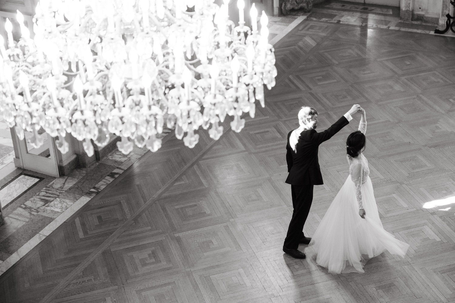 black and white bride and groom dancing