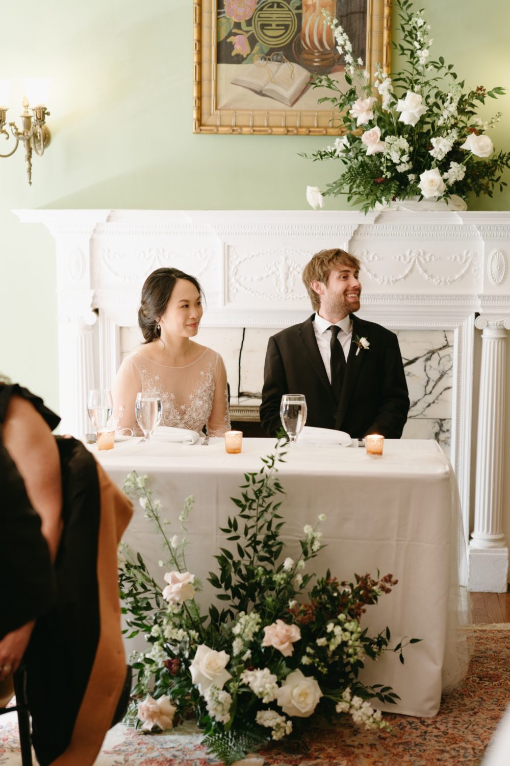 bride and groom reception details smiling