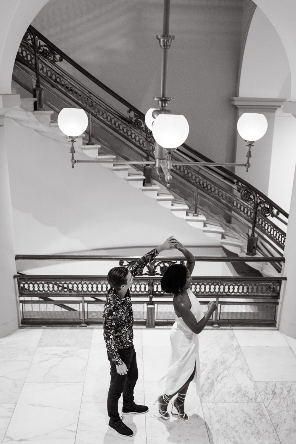 kogod courtyard engagement black and white dancing couple