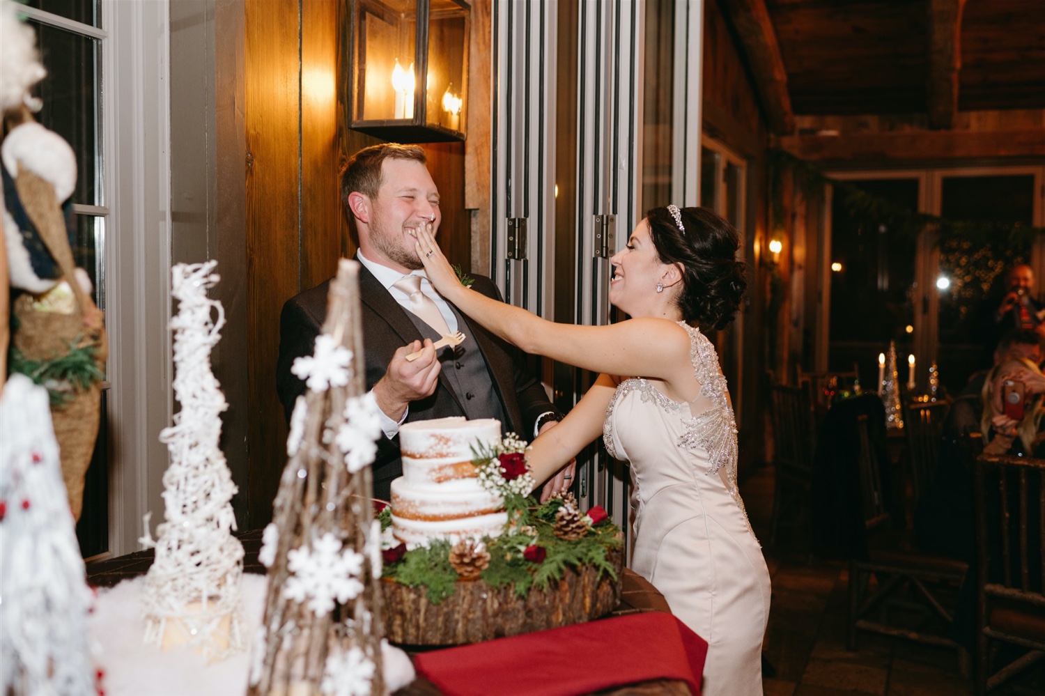 bride and groom cake smash winter wedding