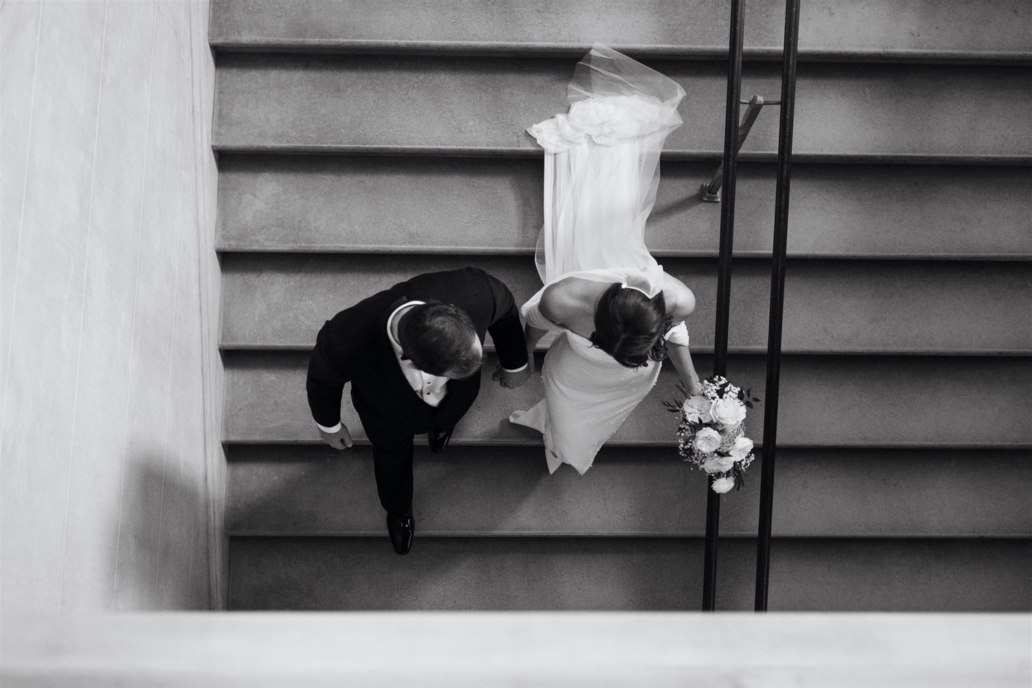 larz anderson house wedding black and white walking down stairs