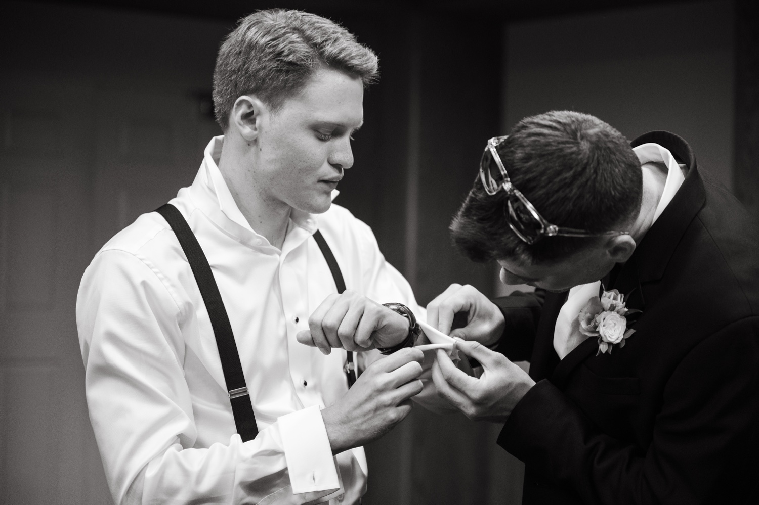 black and white groom and groomsmen getting ready