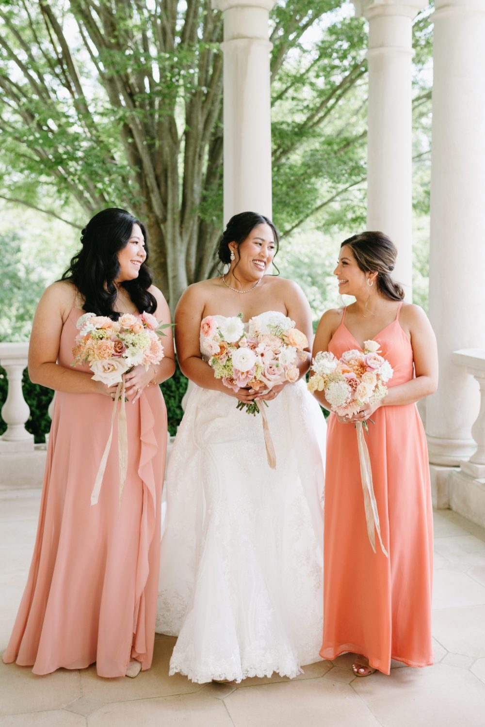 soiree great marsh estate bridal party bridesmaids smiling holding bouquets