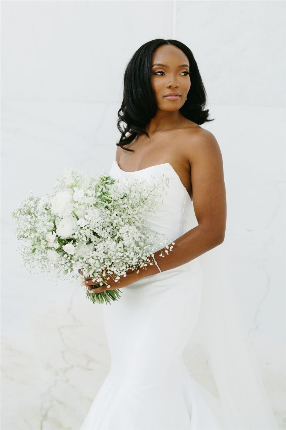 bride white dress white florals