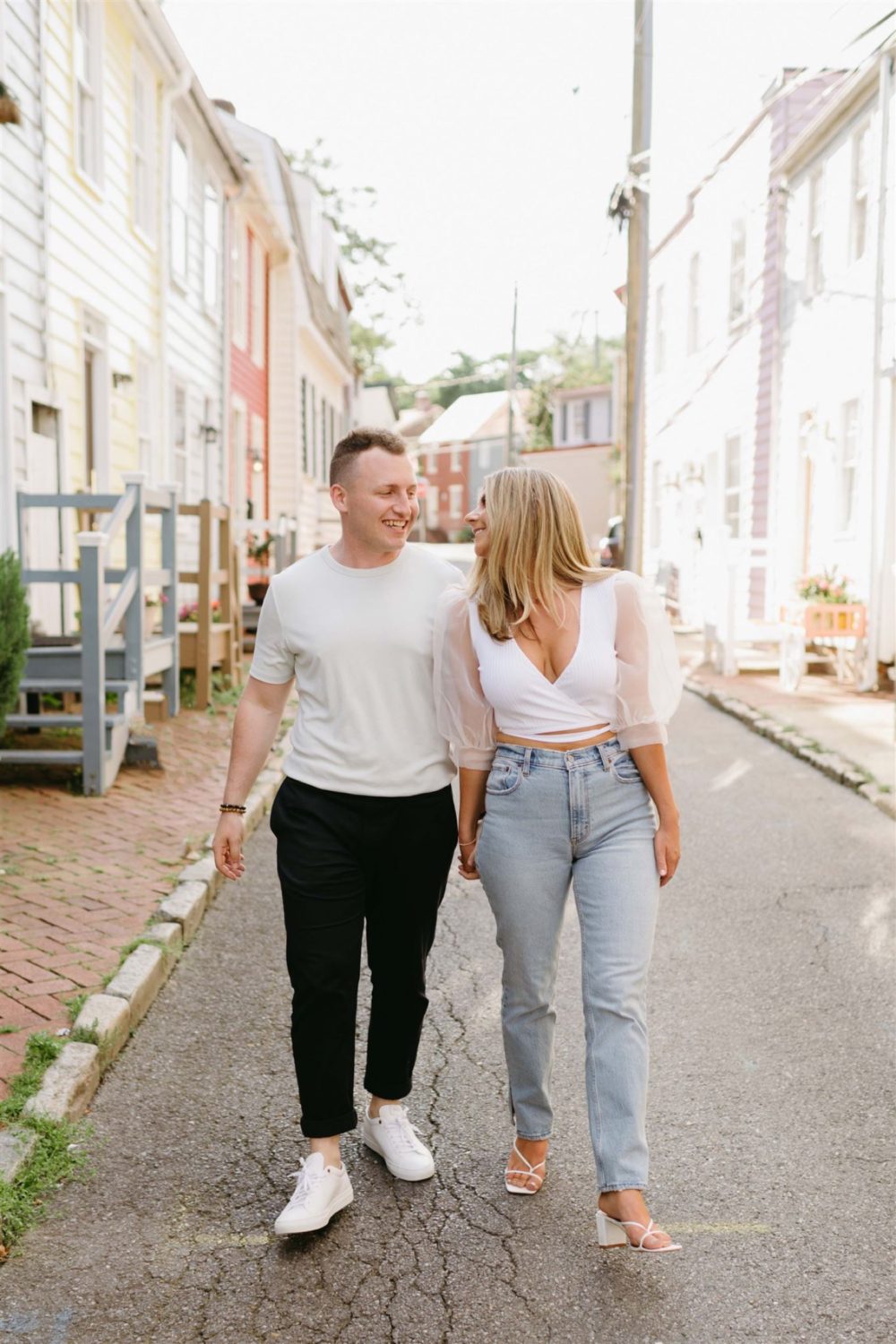 summer annapolis engagement guy and girl walking smiling