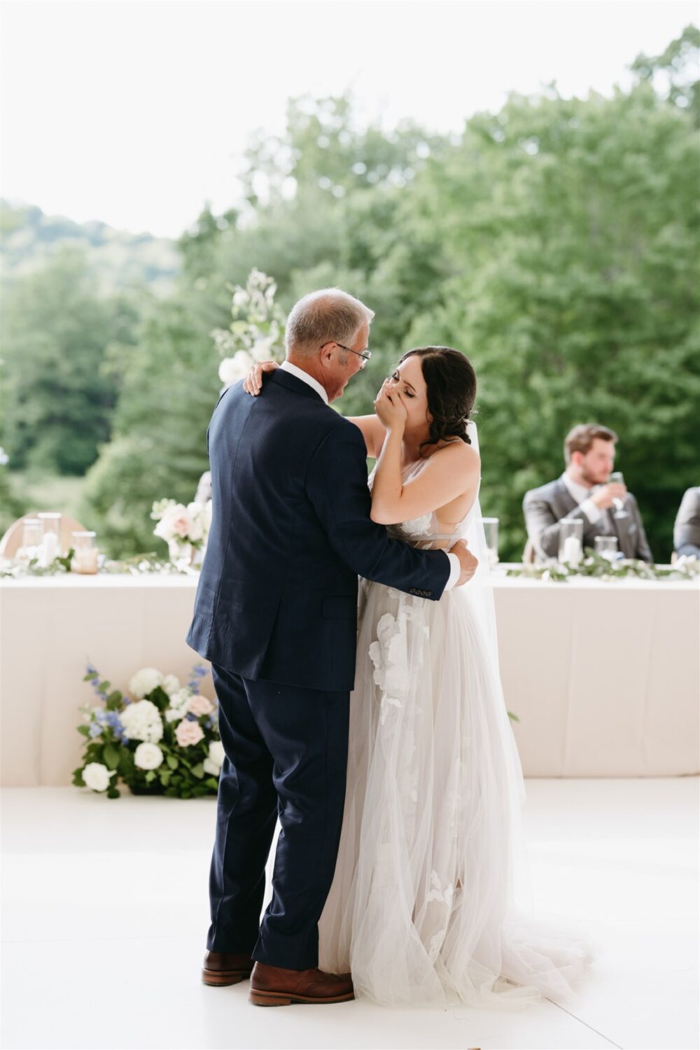 ivy rose barn bride and father of the bride dancing smiling hugging