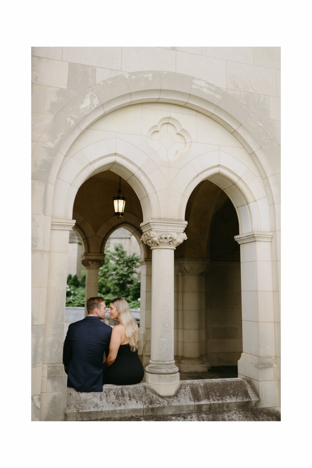 washington dc national cathedral engagement session couple sitting smiling to each other