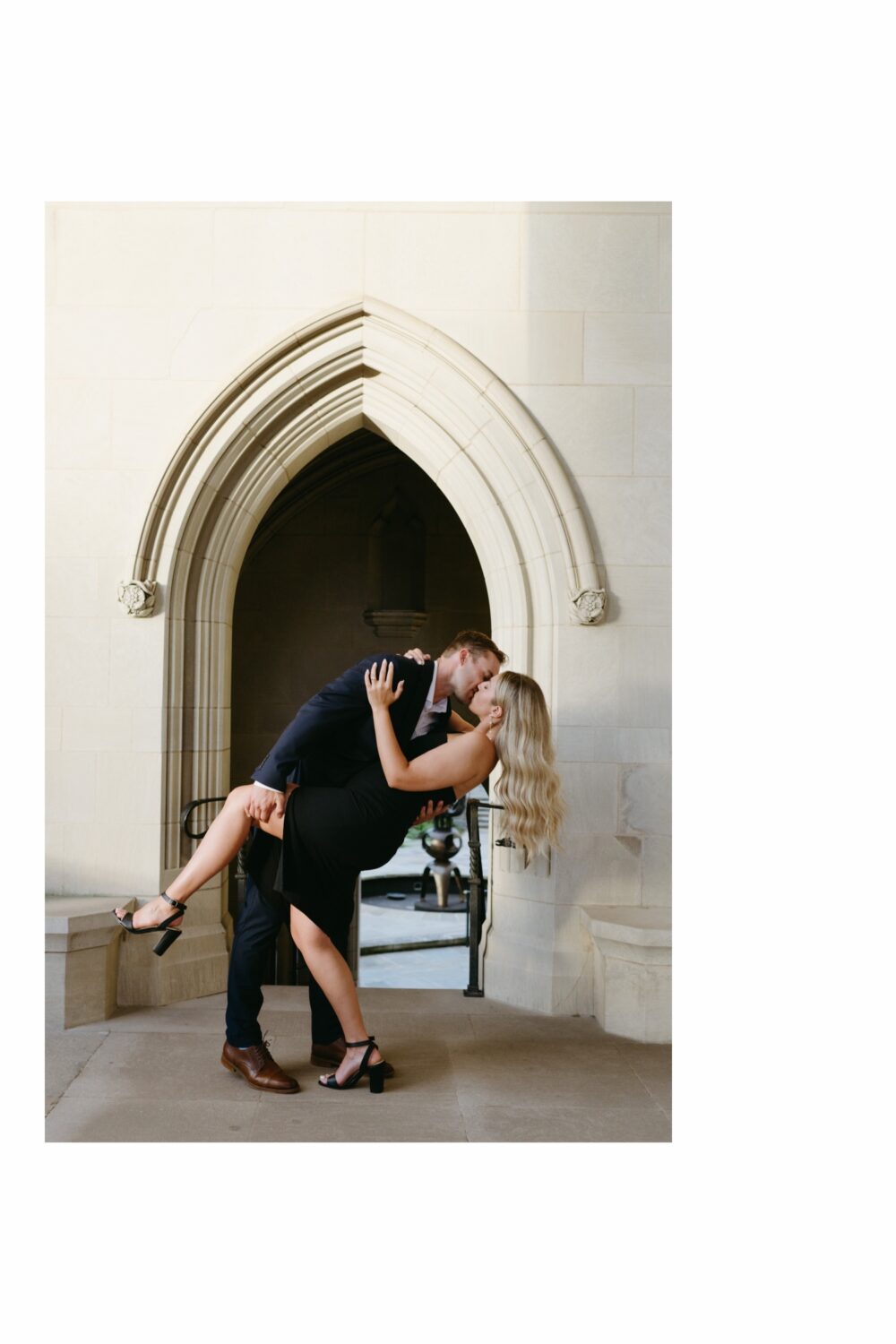 national cathedral engagement session dip pose couple kissing