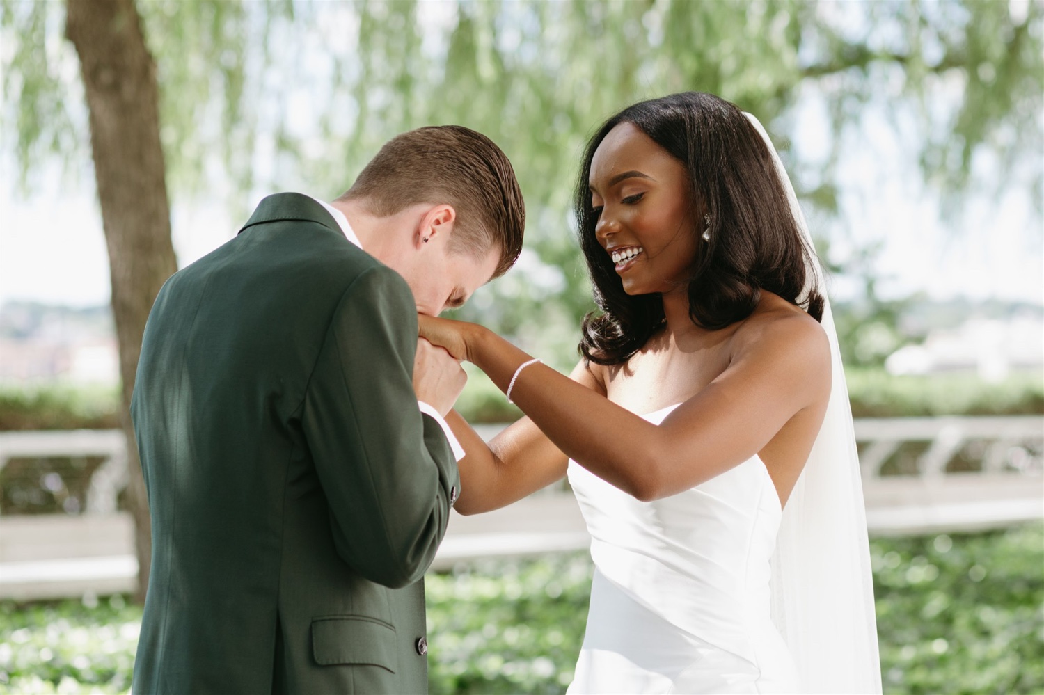 first look monochrome wedding green grooms suit