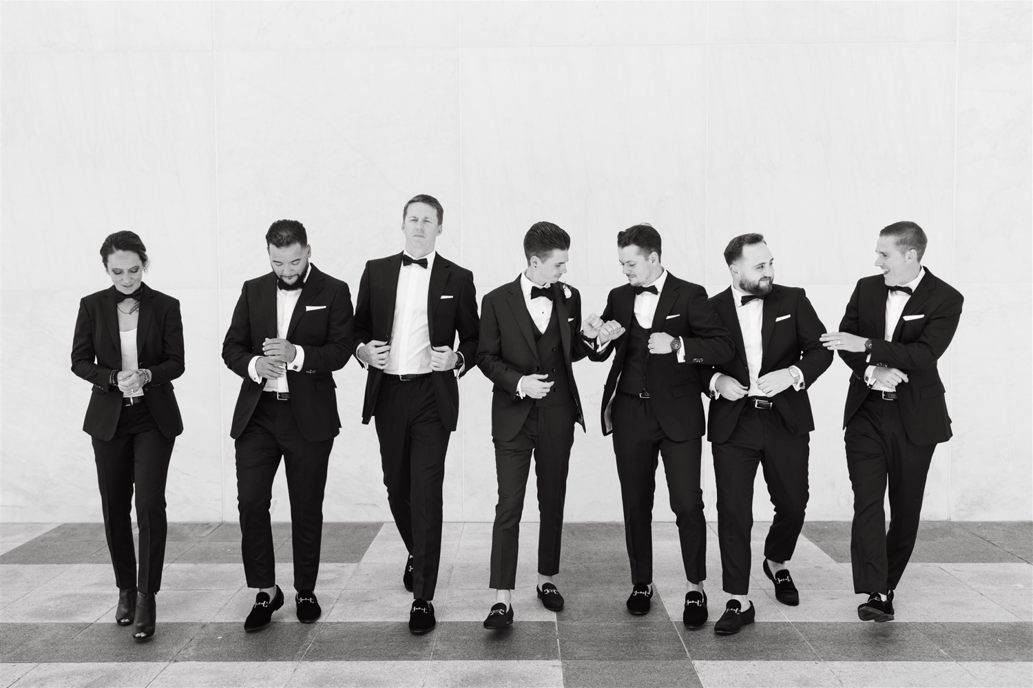 black and white groomsmen photo loafers suit details