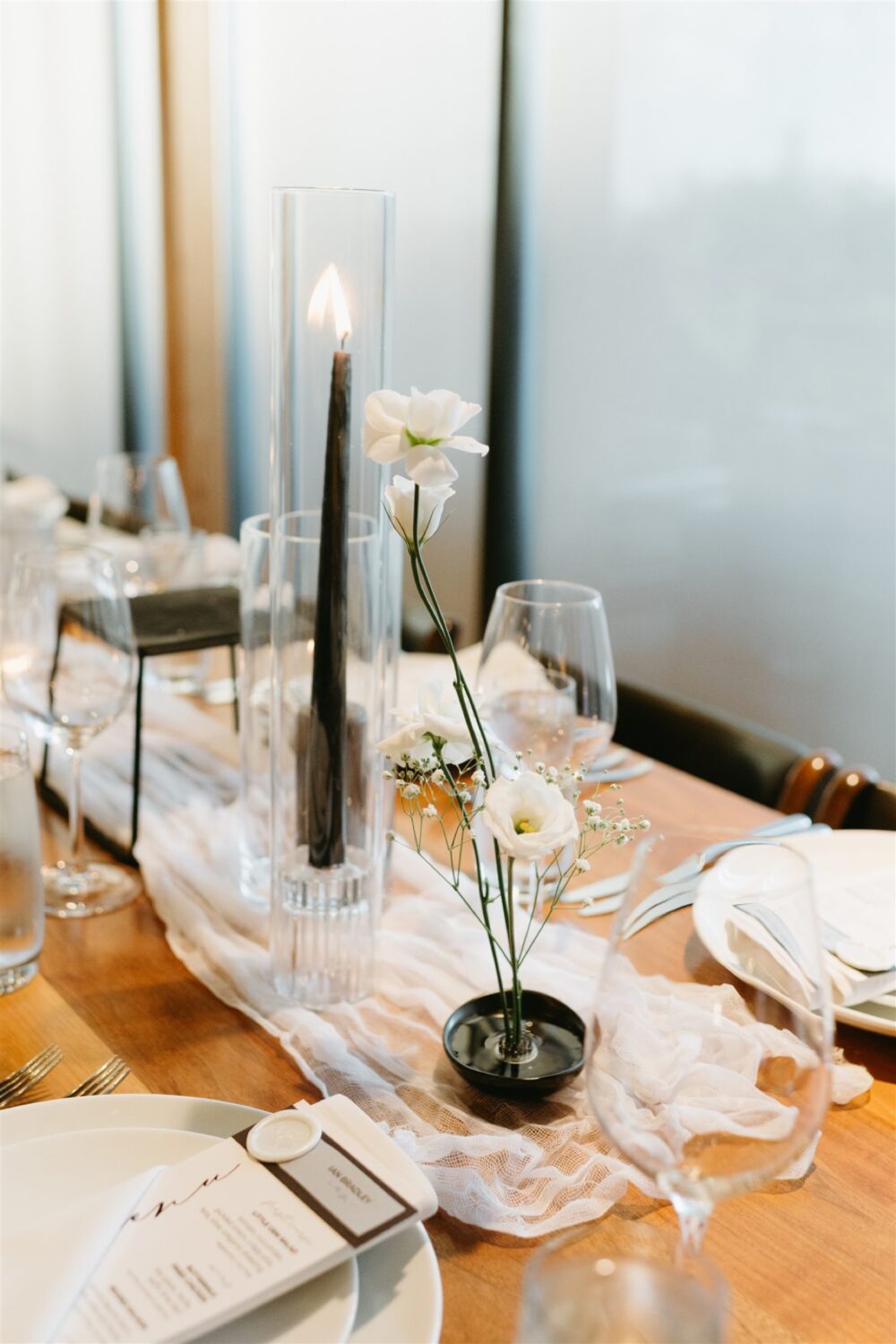 modern district winery wedding green and white florals tablescape