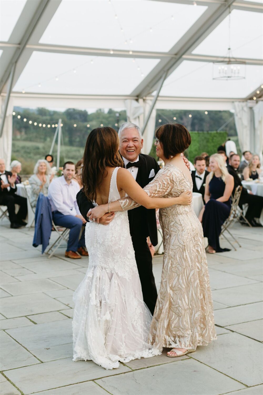 mother father daughter reception dance Ways to Honor Your Mom on Your Wedding Day