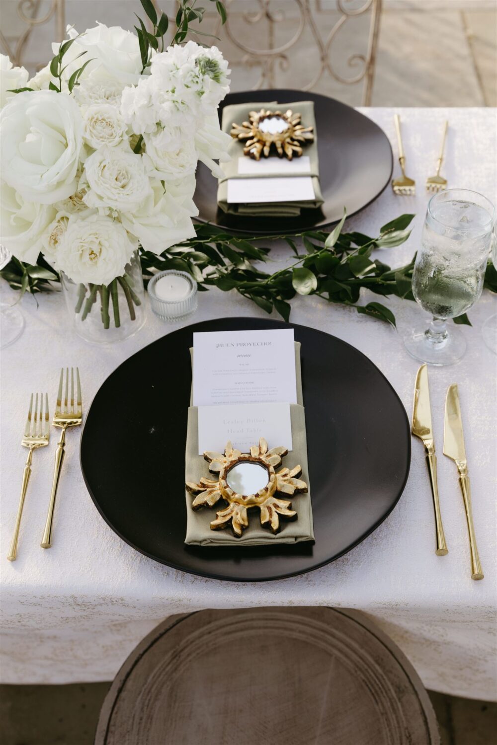 classic elegant garden wedding place setting peruvian gold accents white roses