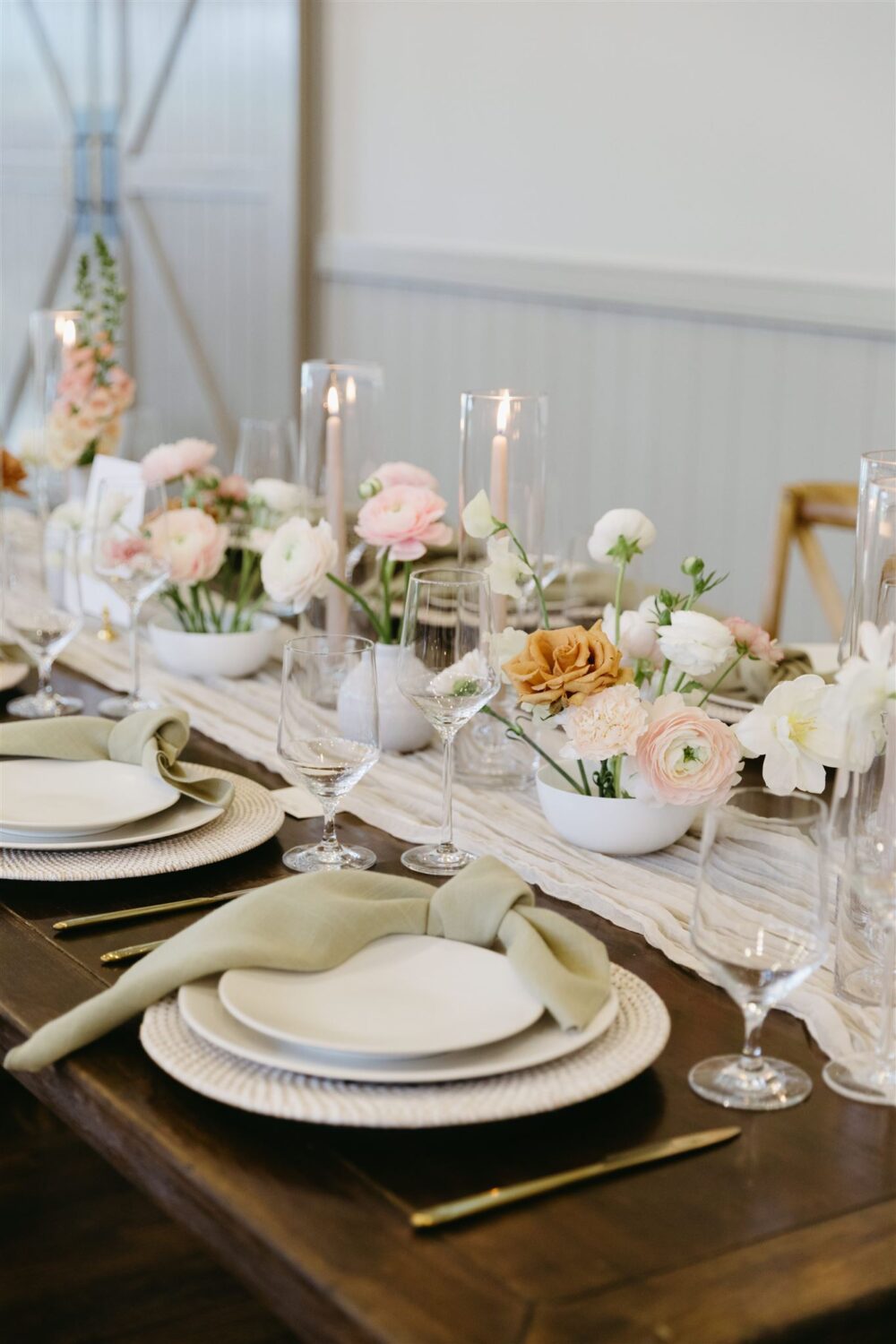 Neutral Garden Inspired wedding reception tablescape pink and white flowers beige table runner hurricane glass candle votives